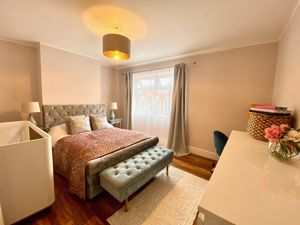 Bedroom One- click for photo gallery